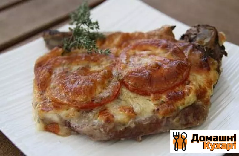 М'ясо по-французьки з помідорами і сиром